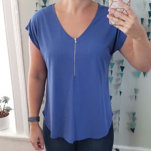 blue shirt with zipper detail